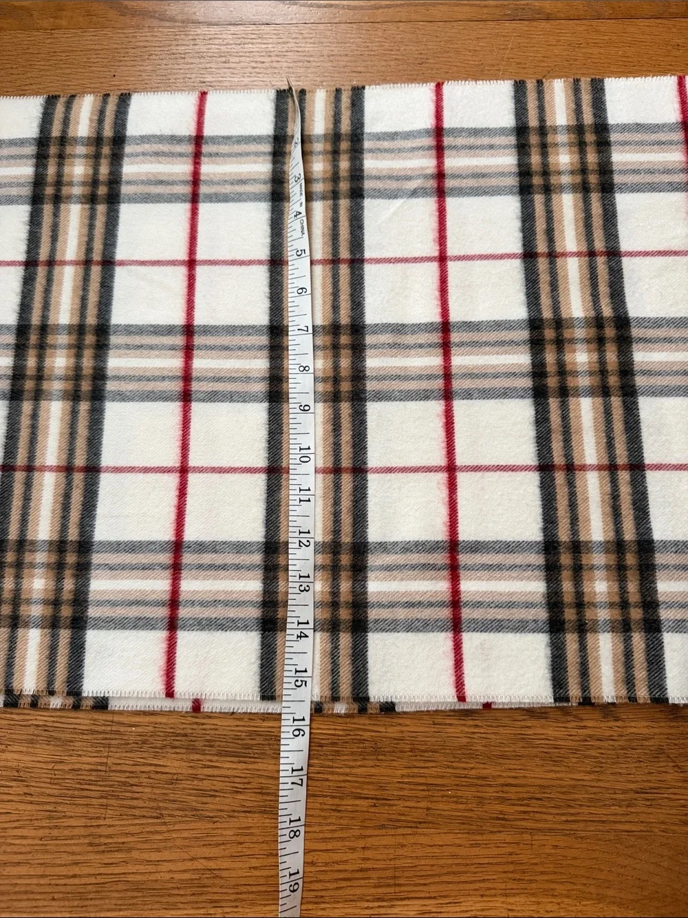 🧣Ivory/red/tan/black plaid Cashmink scarf.